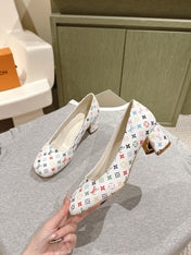 SWING HIGH PUMP 55 MM IN WHITE MONOGRAM CALFSKIN