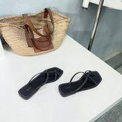 THE ROW 26S FLAT SANDALS IN BLACK CALFSKIN