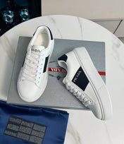 PRADA 25S LEATHER LOGO OUTLET SNEAKERS BLACK AND WHITE CALFSKIN
