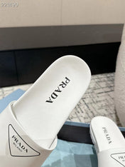 PRADA 25S RUBBER SLIDE IN WHITE CALFSKIN WITH LOGO