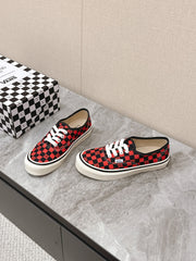 VALENTINO 25S GARAVANI X VANS SNEAKERS IN RED MIX BLACK CANVAS