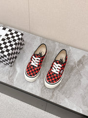 VALENTINO 25S GARAVANI X VANS SNEAKERS IN RED MIX BLACK CANVAS