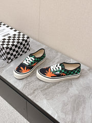 VALENTINO 25S GARAVANI X VANS SNEAKERS IN GREEN MIX BLACK CANVAS