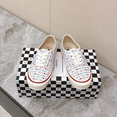 VALENTINO 25S GARAVANI X VANS SNEAKERS IN WHITE MIX BLUE CANVAS