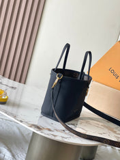 NEVERFULL BANDOULIÈRE INSIDE OUT BB 24 IN BROWN MONOGRAM CANVAS AND BLACK CALFSKIN