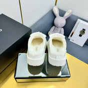 THICK-SOLED SLIDE IN WHITE LAMBSKIN AND WOOL LINING