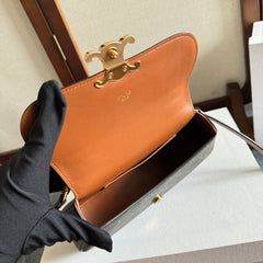 TEEN LOLA 20 IN BLACK TRIOMPHE CANVAS GOLD HARDWARE