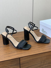 HIGH HEEL EMBROIDERED SANDAL IN BLACK CALFSKIN AND WOVEN STRAPS