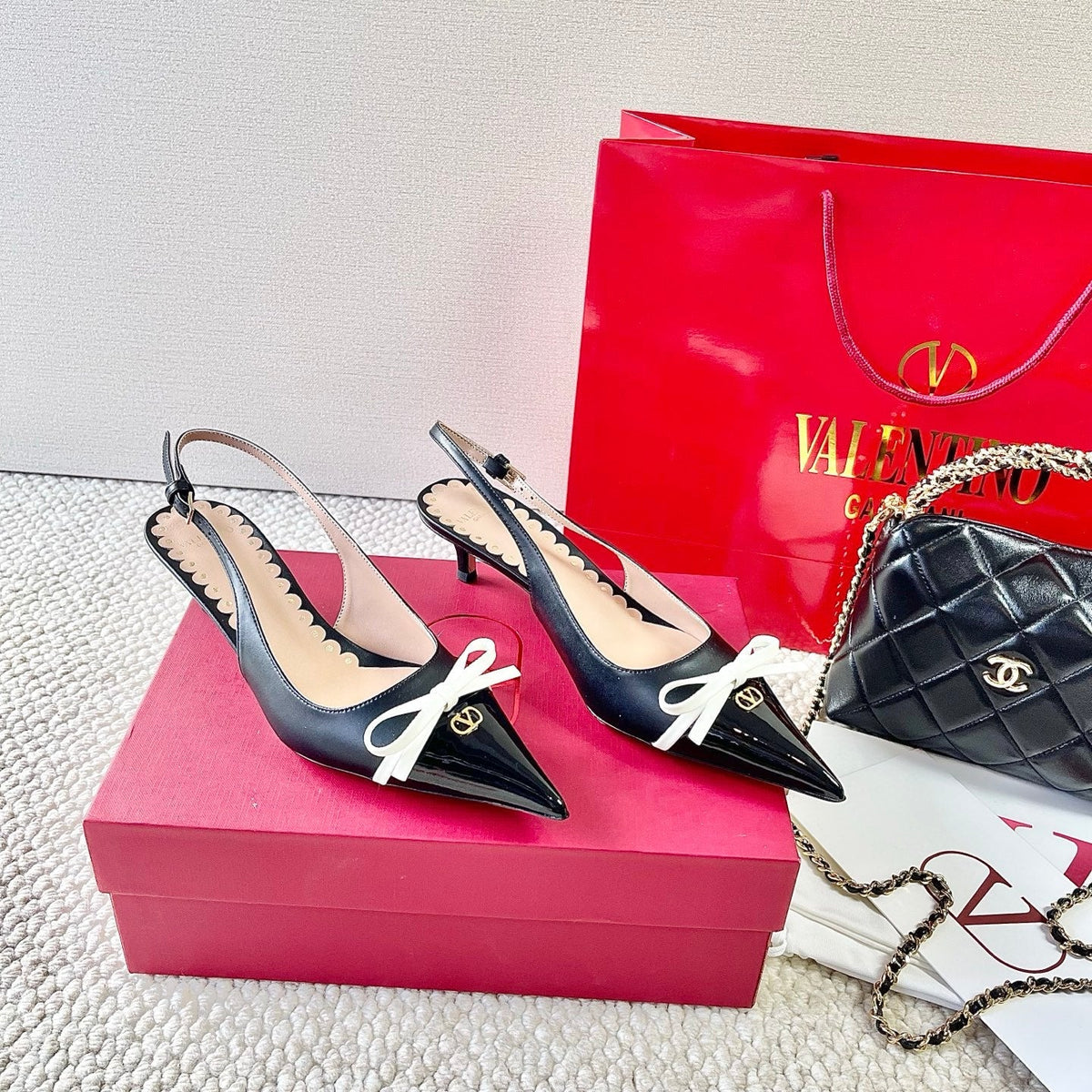 VLTN HIGH SLINGBACK 25S 40 MM IN BLACK LAMBSKIN WITH BOW