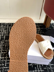 CELINE 26S TRIOMPHE FLAT SLIDES IN WHITE WOOL