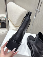 CELINE 26S CHUNKY-SOLE COMBAT BOOTS IN BLACK CALFSKIN