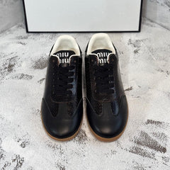 RETRO SNEAKERS IN BLACK LAMBSKIN WITH KNITTED PATTERN