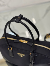 LARGE TOP HANDLE BAG 35 IN BLACK NYLON AND CALFSKIN TRIM