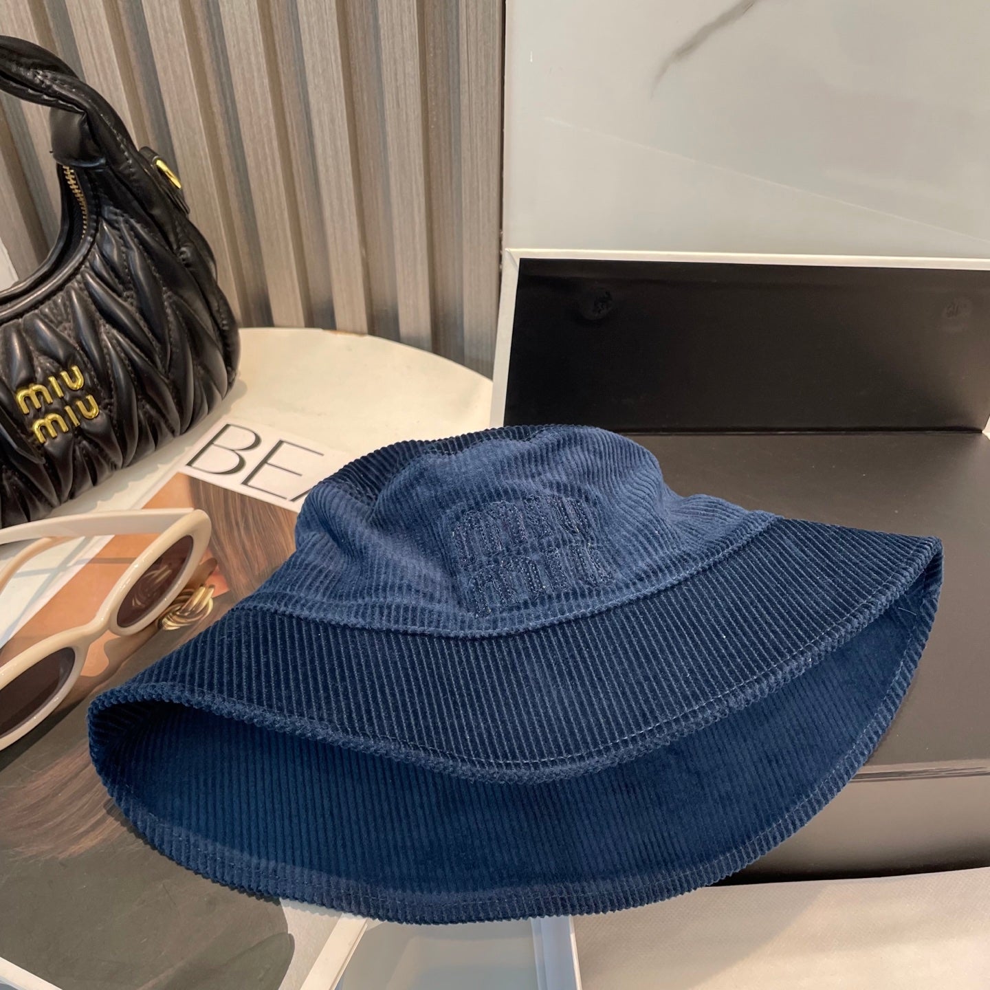 MM BUCKET IN NAVY BLUE VELVET WITH LOGO