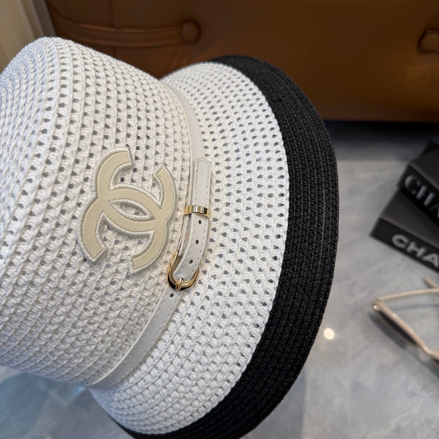 CHANEL 26S FLAT-BRIM STRAW HAT WITH RAISED CC LOGO 338109