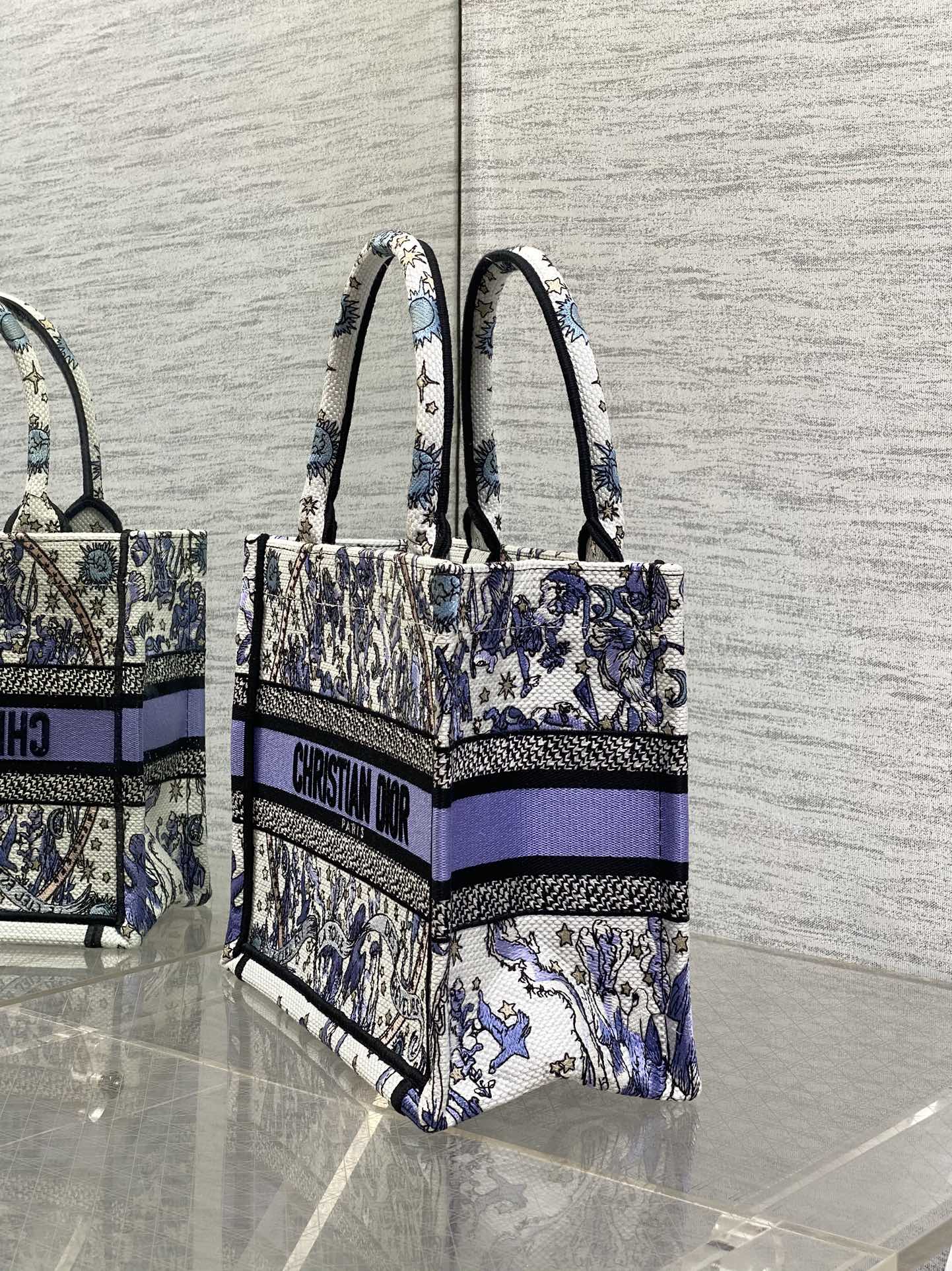 DIOR 25S SMALL BOOK TOTE 26 IN WHITE AND PURPLE DIOR NIGHT OF DREAMS EMBROIDERY