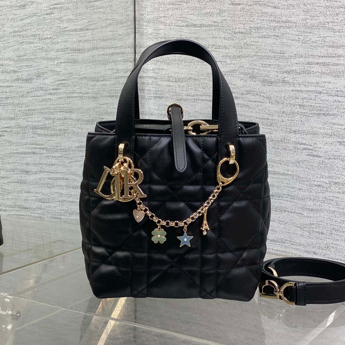 DIOR 25S TOUJOURS VERTICAL TOTE BAG 18 IN BLACK CALFSKIN WITH CHARM BRACELET STRAP