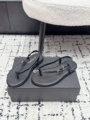 CHANEL 26S THONG SANDALS IN BLACK CALFSKIN WITH GOLD HARDWARE