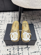 CHANEL 26S FLAT MULES IN GOLD LAMBSKIN