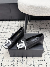 CHANEL 26S HIGH HEELS IN BLACK LAMBSKIN WITH BOW