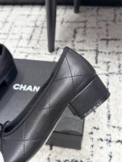 CHANEL 26S HIGH HEELS IN BLACK LAMBSKIN WITH BOW