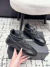 CHANEL 26S LACE-UP SNEAKERS IN BLACK FABRIC AND LAMBSKIN