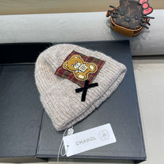 BEANIE HAT IN CAMEL BEIGE WOOL WITH BOW 421255
