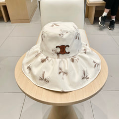 CELINE 25S BUCKET BOW HAT 733404 IN IVORY