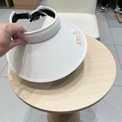 MM FASHION VISOR CAP IN BLACK AND WHITE WITH LOGO TEXT EMBROIDERY