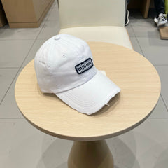 MM DISTRESSED FABRIC BASEBALL CAP IN WHITE WITH EMBROIDERED LOGO