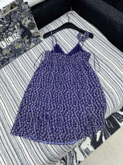 CHANEL DARK PURPLE SILK CAMELLIA DRESS WITH PEARL DETAILS