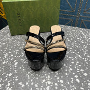 HIGH WEDGE PLATFORM IN BLACK CALFSKIN WITH GOLD HARDWARE