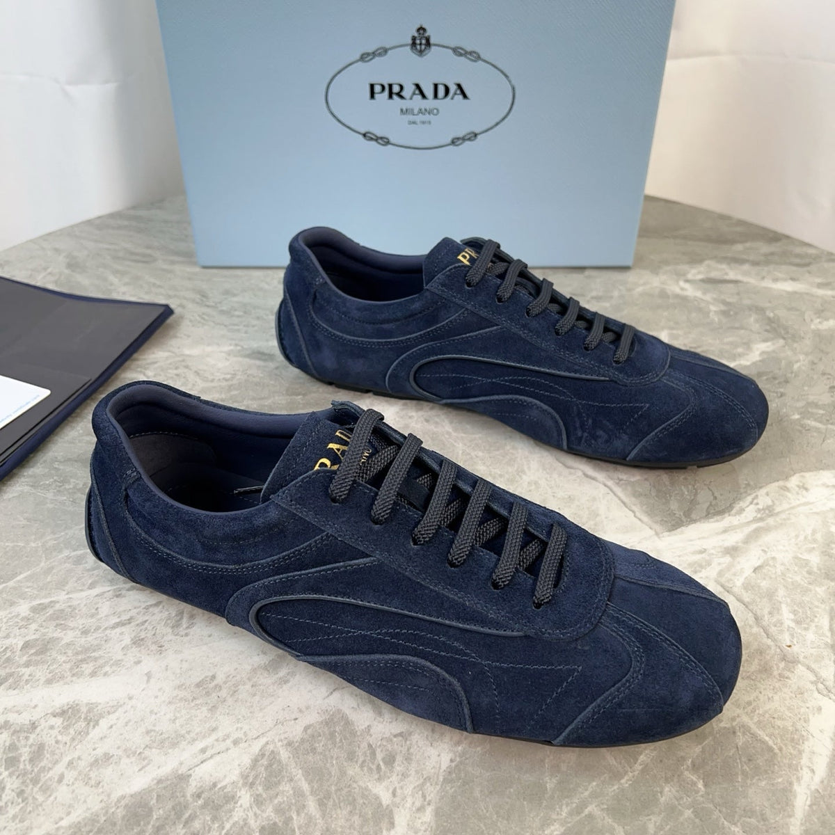 PRADA 25S MONTECARLO ANTIQUED SNEAKERS IN NAVY BLUE SUEDE