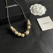 CHANEL 26S DOUBLE C LOGO PEARL BEADED BRACELET WITH CRYSTAL DETAIL IN GOLD METAL 631014