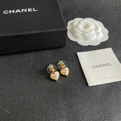 CHANEL 26S DOUBLE C HEART DROP EARRINGS WITH WHITE ENAMEL FLORAL DETAIL IN GOLD METAL 631910