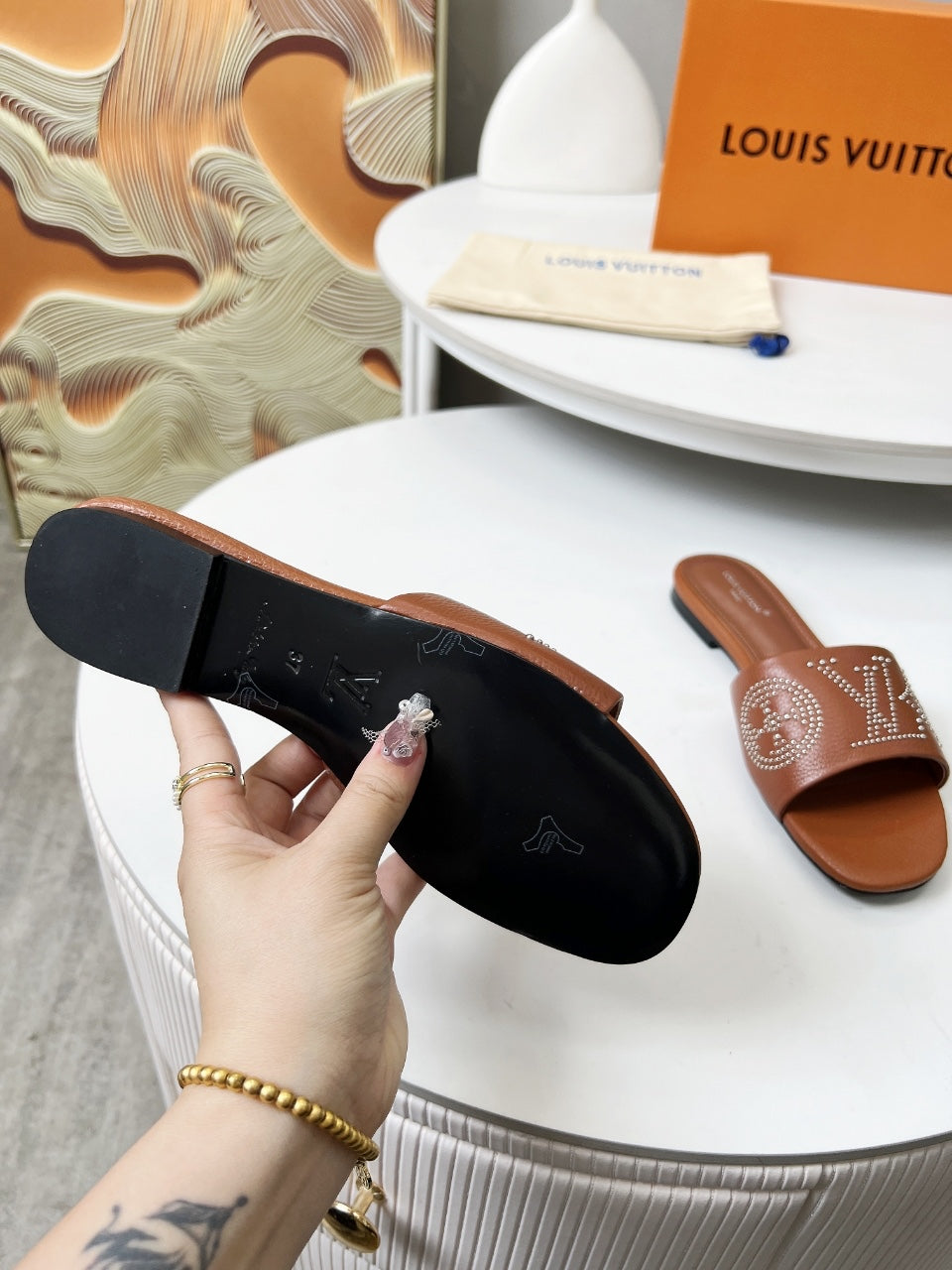 FLAT SLIDE IN BRONZE BROWN LAMBSKIN WITH RHINSTONES