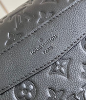 MESSENGER VOYAGER PM 33 IN BLACK MONOGRAM SHADOW CALFSKIN