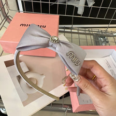 SILK BOW HEADBAND LANGUID LAVENDER 159004