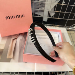 SILK HAIRBAND ATTACHED CRYSTAL LOGO BLACK 196475