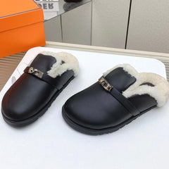 SLIP-ON MULE IN BLACK CALFSKIN AND SHEARLING LINING