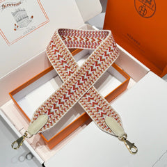 25S HERMES BAG STRAP ORANGE AND RED PATTERN 85 IN CANVAS GOLD HARDWARE