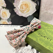 HAIRBAND IN LIGHT PINK FLORAL FABRIC 385853