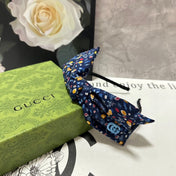 HAIRBAND IN NAVY BLUE FLORAL FABRIC 385854