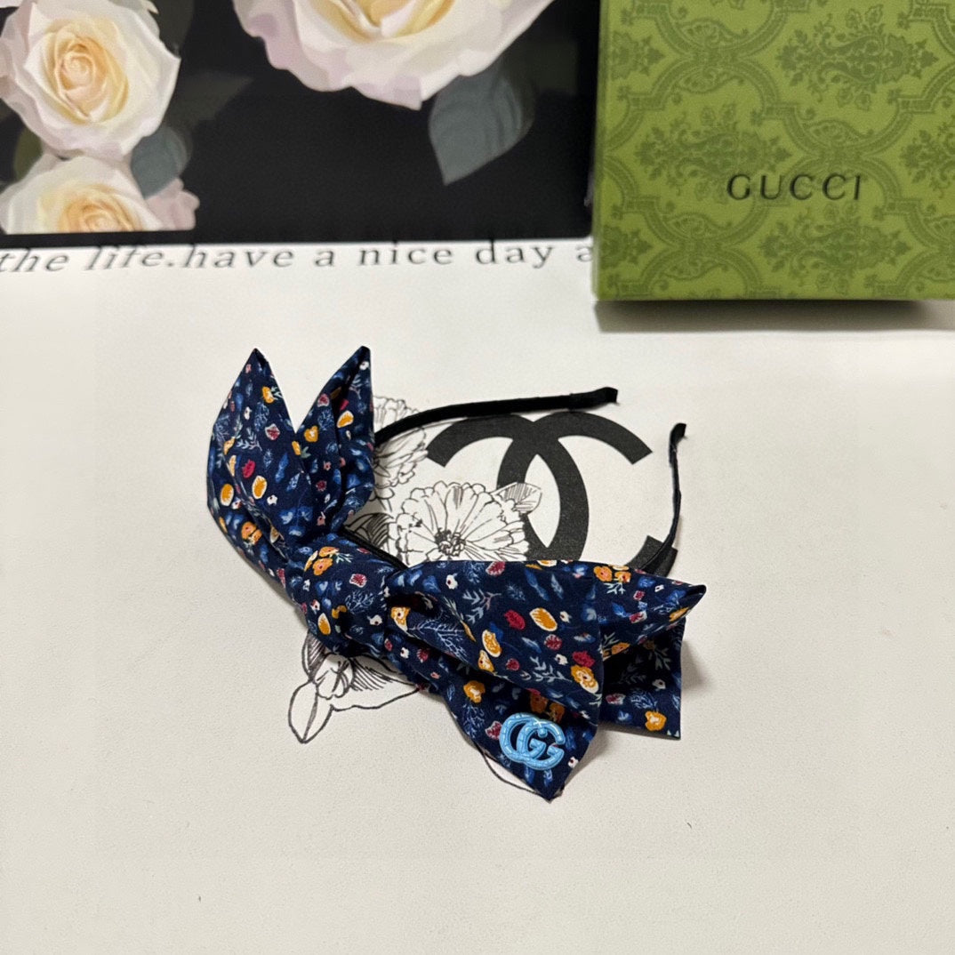 HAIRBAND IN NAVY BLUE FLORAL FABRIC 385854