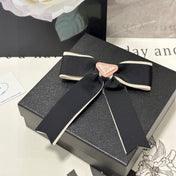 BOW HAIR CLIP IN BLACK MIX BEIGE FABRIC 406108