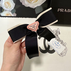 BOW HAIR CLIP IN BLACK MIX BEIGE FABRIC 406108