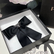 BOW HAIR CLIP IN BLACK RE-NYLON 423593