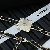 CHAIN CHOKER IN GOLD-PLATED METAL WITH  LEATHER THROUGH LINKS