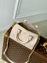 SPEEDY BANDOULIÈRE 20.5 IN LIGHT PINK MONOGRAM EMPREINTE CANVAS