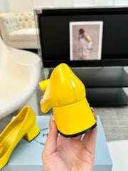 SQUARE TOE PUMPS IN YELLOW GLOSSY CALFSKIN ATTACHED BOW